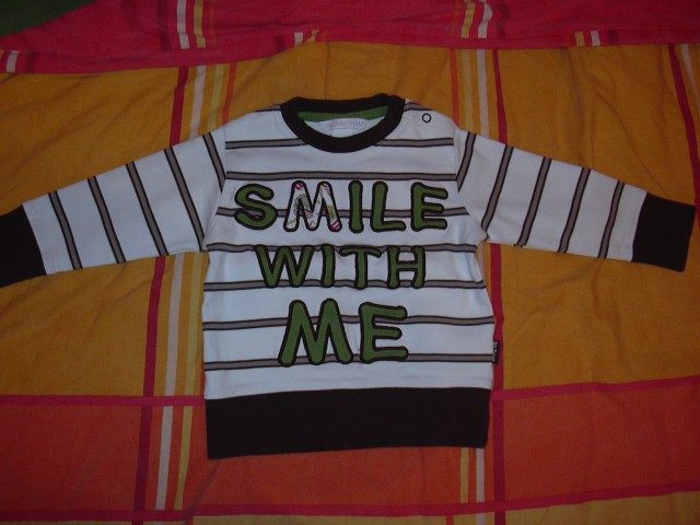 Samo 1xoblečena (žal kupljena  skoraj premajhna) je pa nova kolekcija 09 H&M ....5,5eur