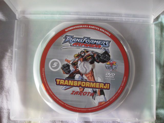 Risanka Transformerji: Zarota (dvd 5), 2€