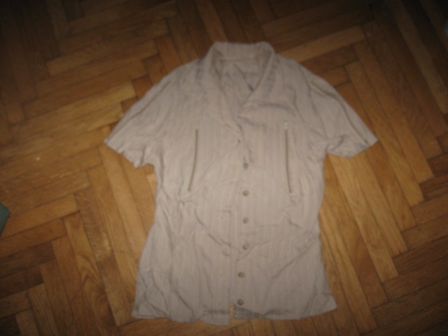 nova, nenošena bluza z zadrgami št.40, 7€