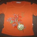 oranžna majica vel.140, 2€