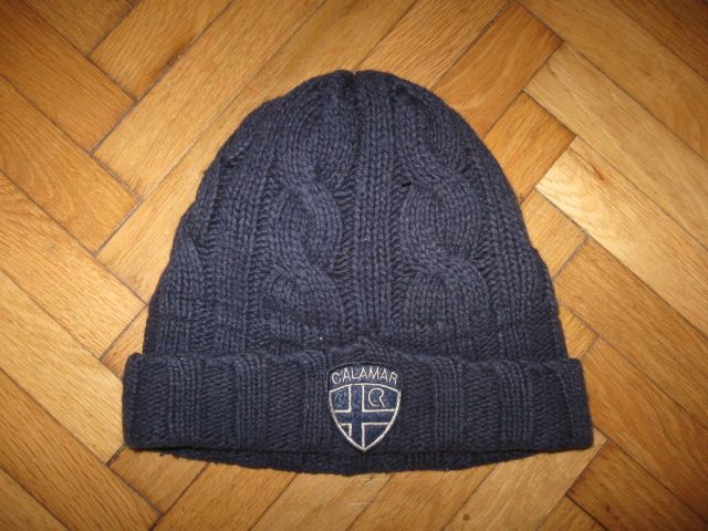 Temno modra pletena podložena kapa Calamar, vel.56/58, 2,5€