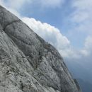 plezalec na vrhu tapete