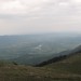 Oblačen razgled s Kuclja na Vipavsko dolino in Vogrsko jezero.